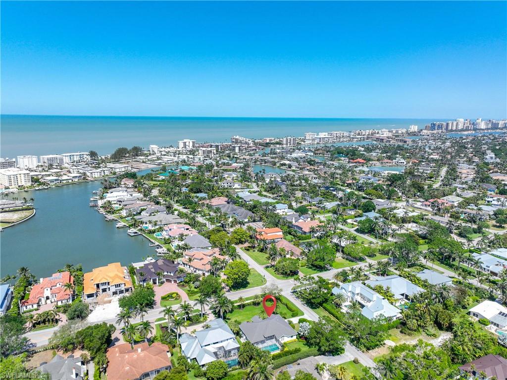 1850 Crayton Road Naples, FL 34102 - Photo 3 of 48 view of city and ocean