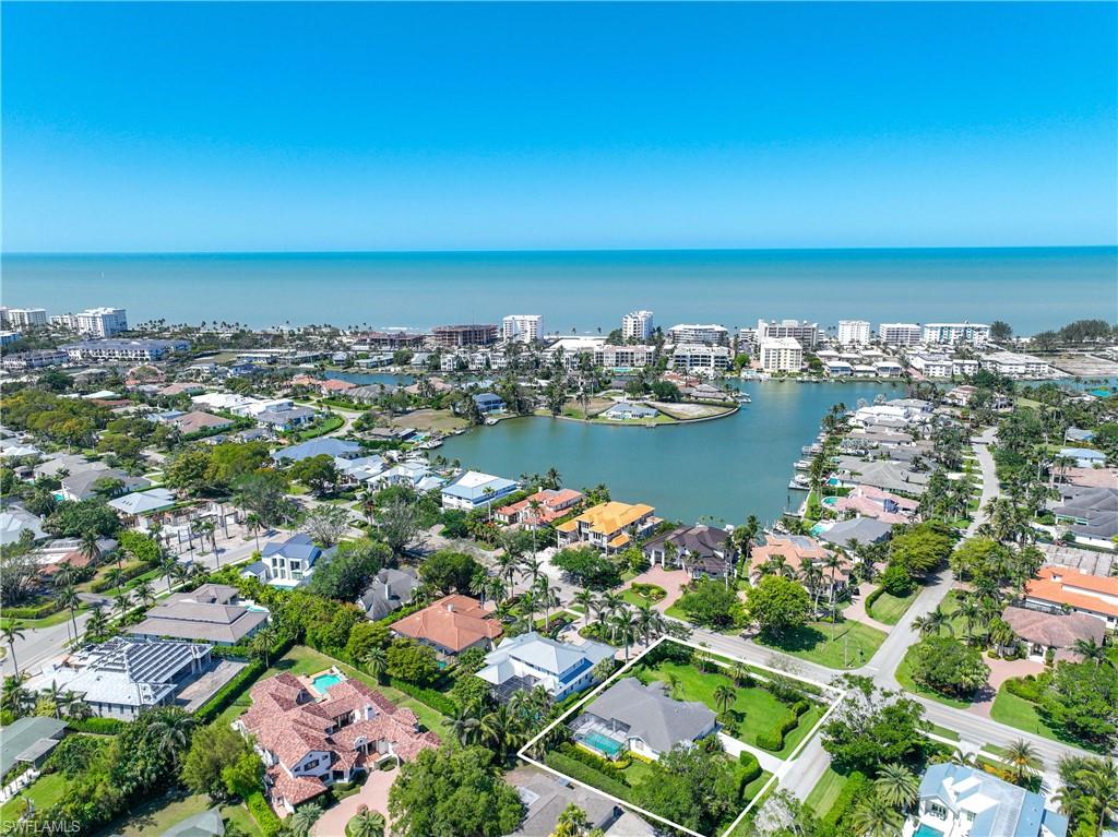 1850 Crayton Road Naples, FL 34102 - Photo 6 of 48 an aerial view of ocean and residential houses with outdoor space