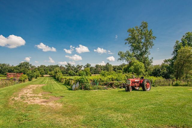 a childrens park with lots of swings and slides