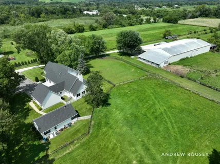 an aerial view of a house with a garden