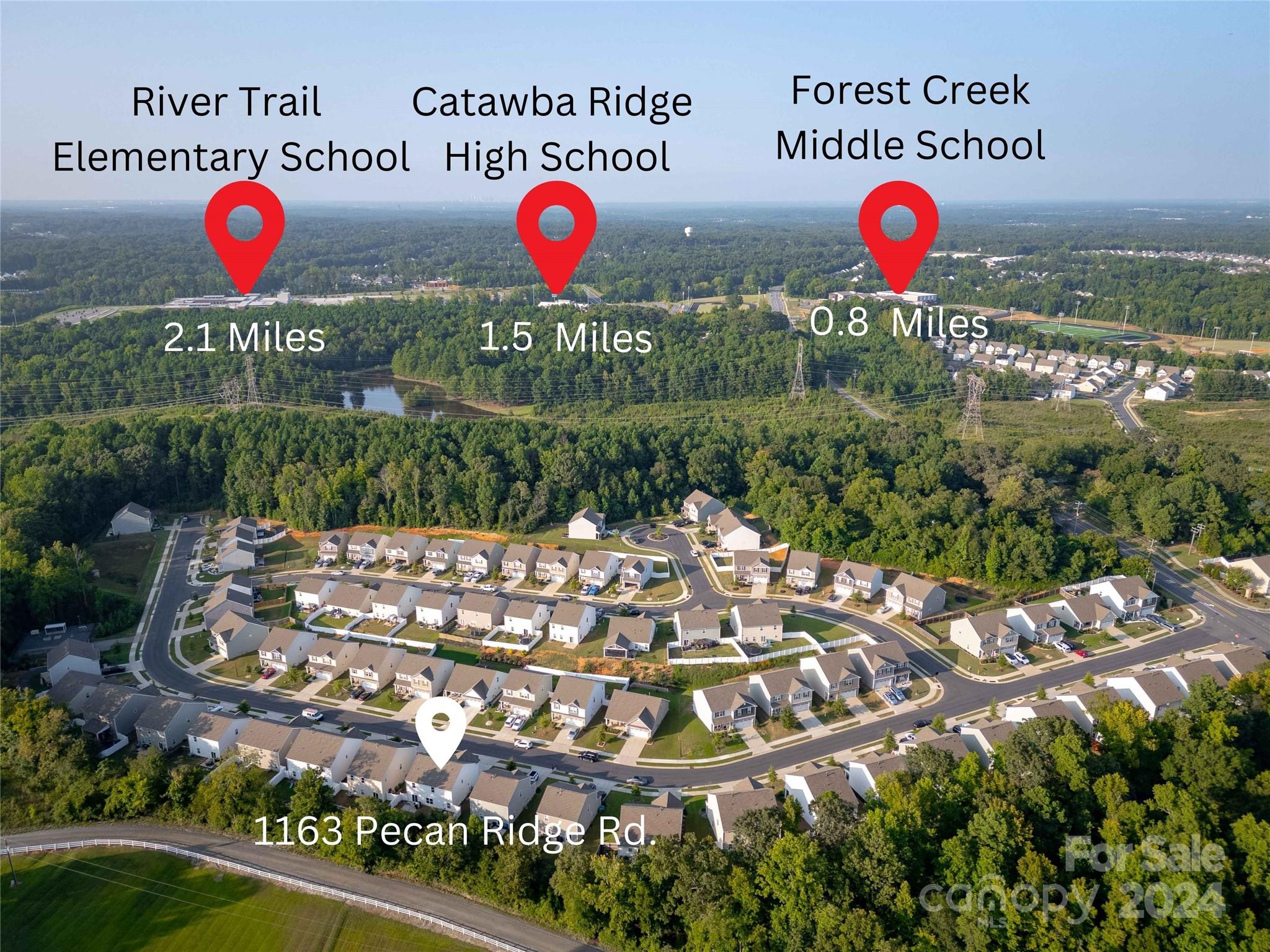 1163 Pecan Ridge Road Fort Mill, SC 29715 - Photo 2 of 34 a view of a table with chairs and potted plants