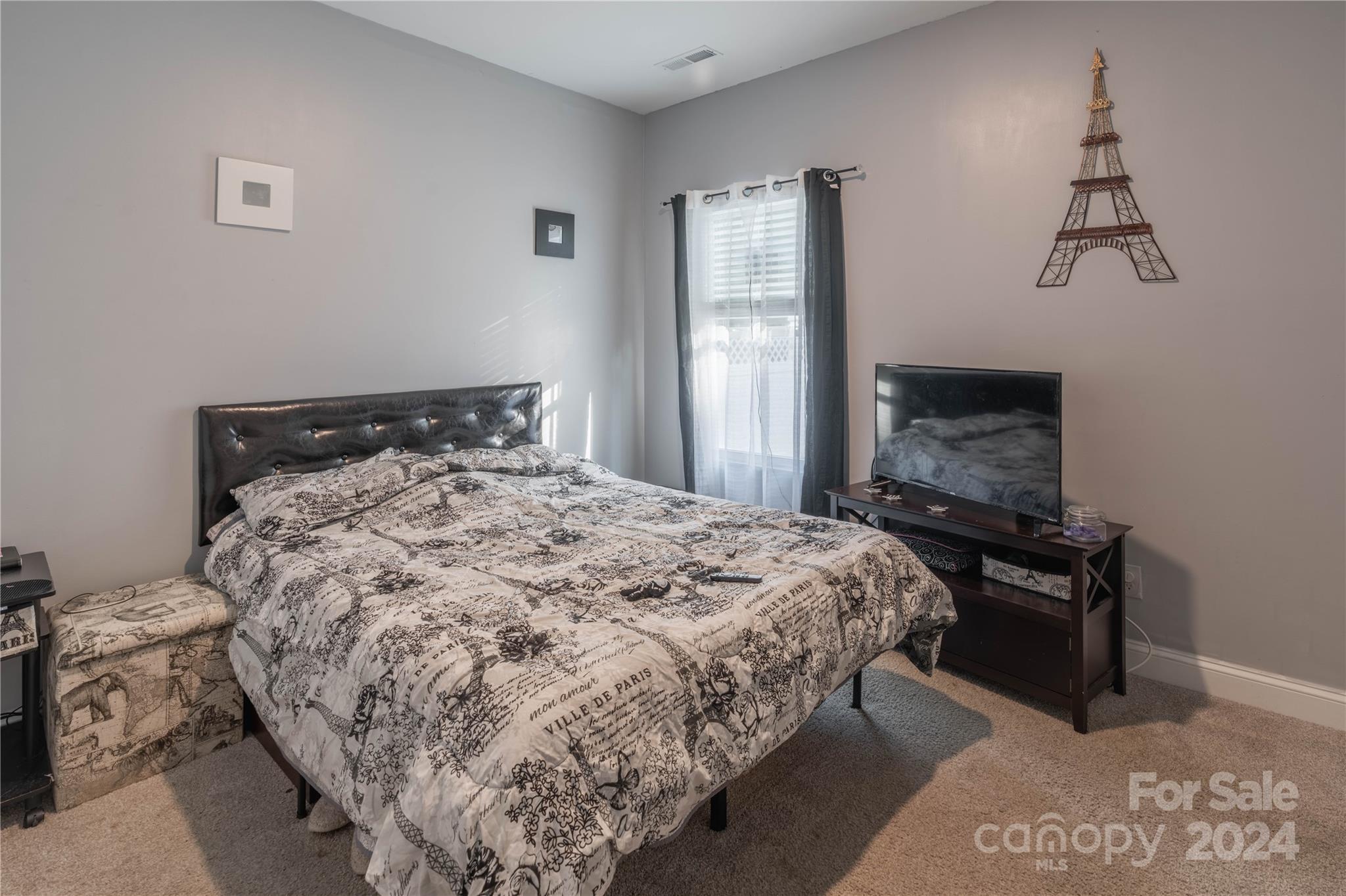 1163 Pecan Ridge Road Fort Mill, SC 29715 - Photo 29 of 34 a bedroom with a bed and a television