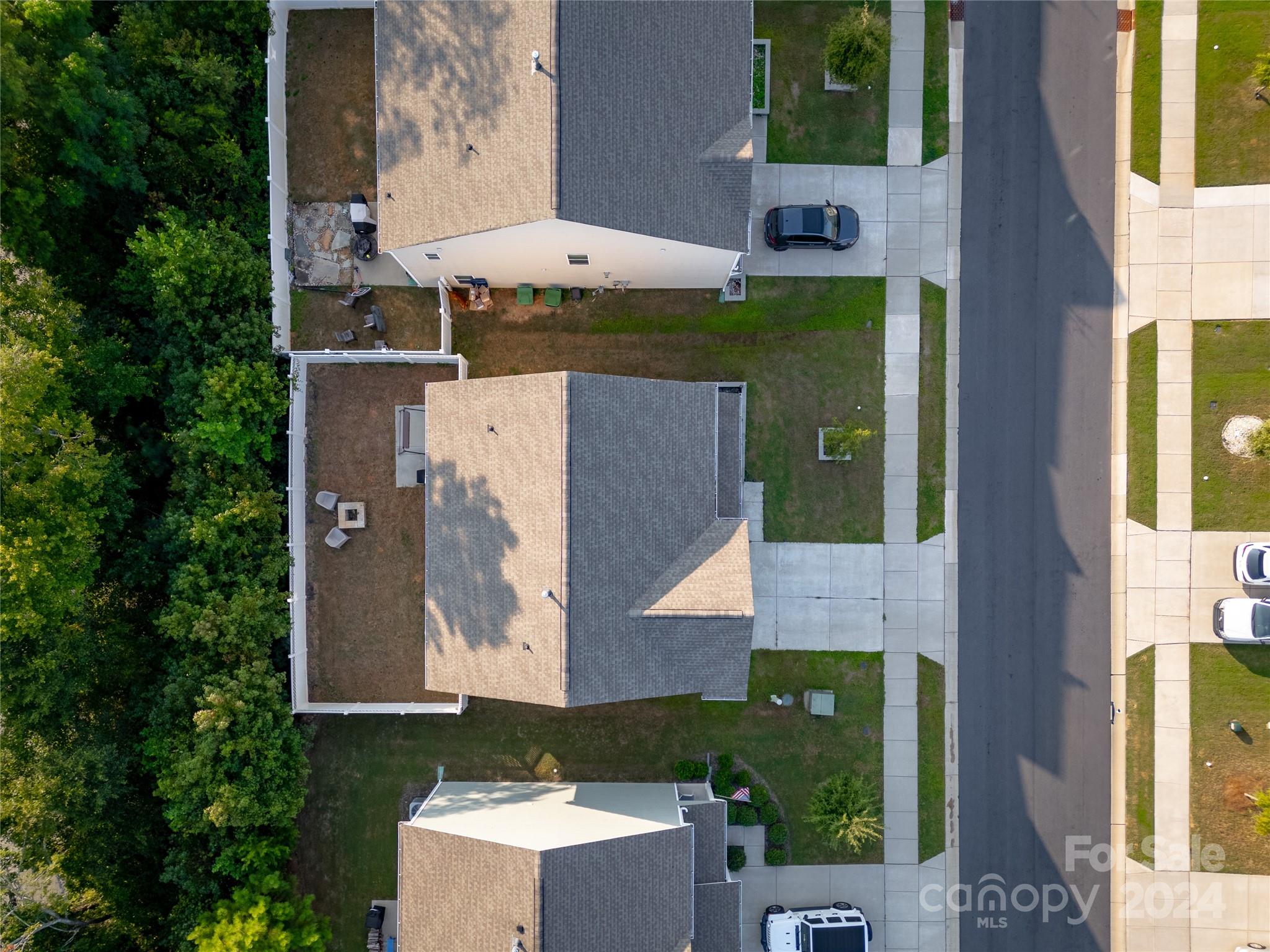 1163 Pecan Ridge Road Fort Mill, SC 29715 - Photo 30 of 34 an aerial view of a house with a yard