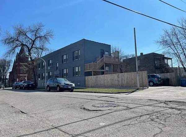 a view of a house with a snow in front of it