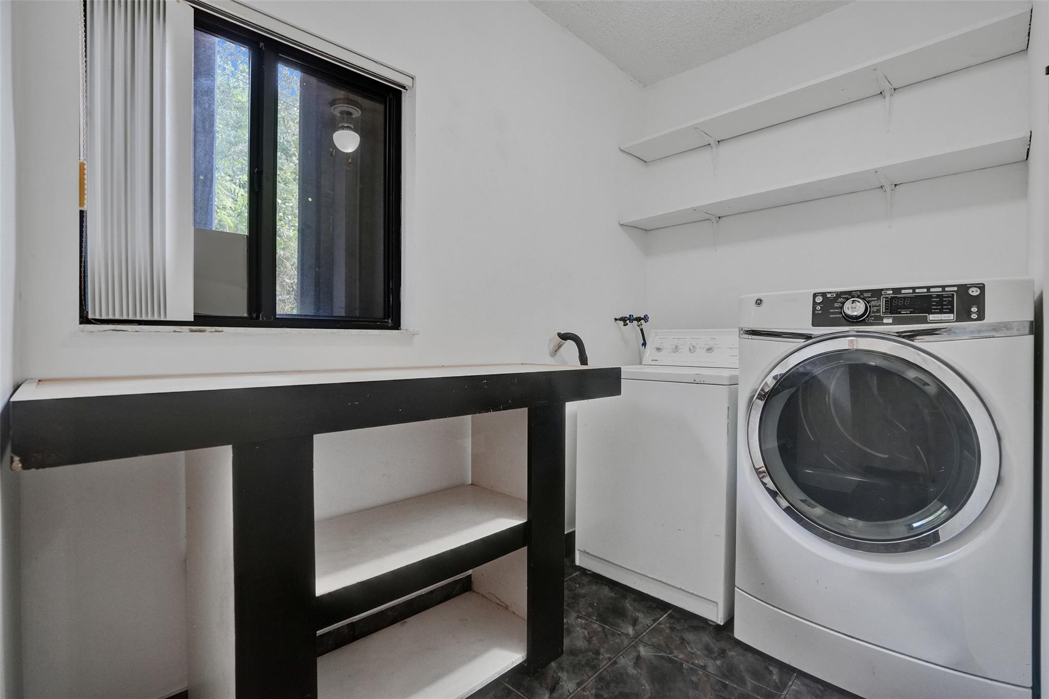 225 Pocatella Street Miami Springs, FL 33166 - Photo 15 of 56 a utility room with dryer and washer