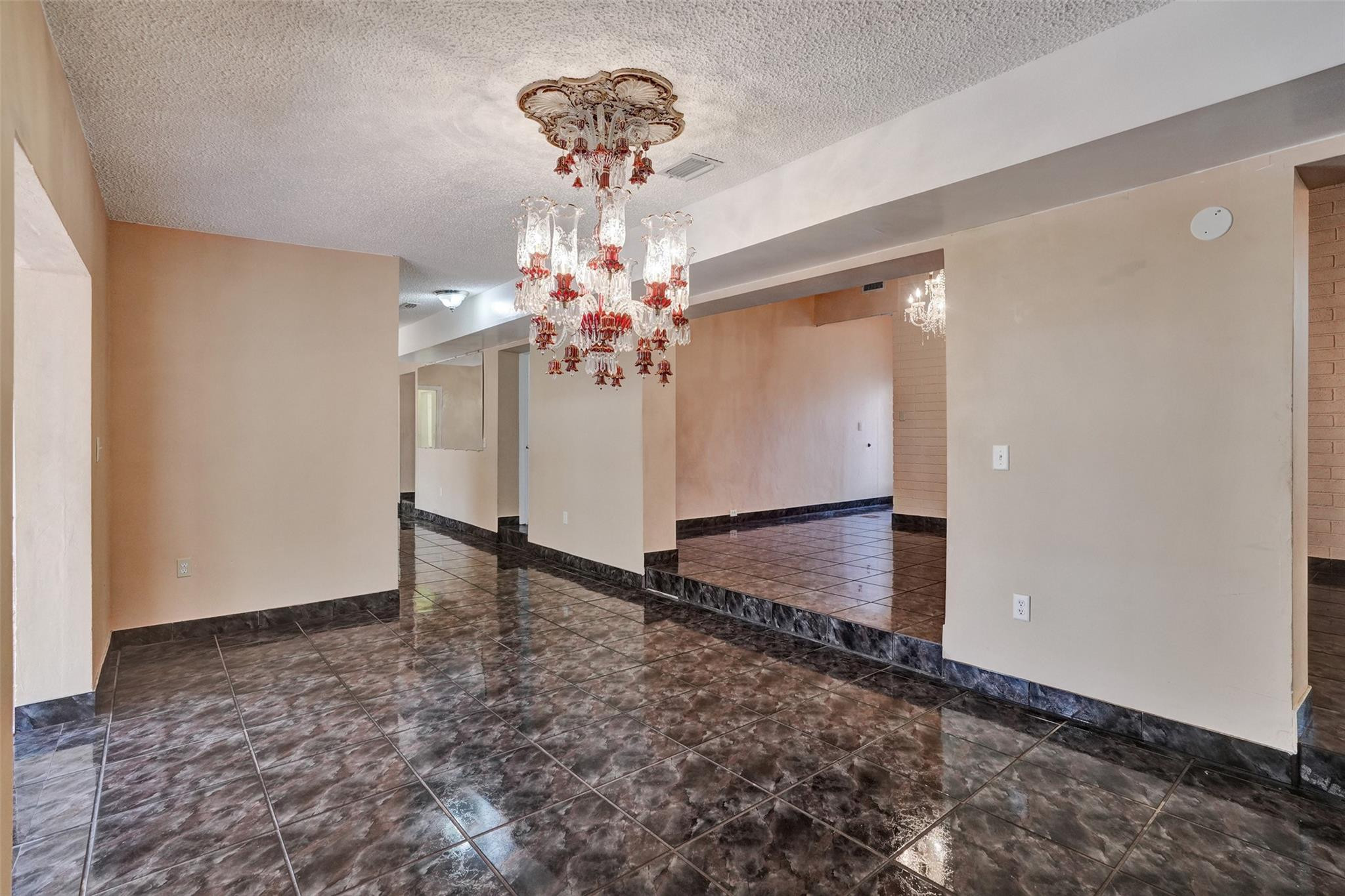 225 Pocatella Street Miami Springs, FL 33166 - Photo 17 of 56 a view of a chandelier fan and entryway