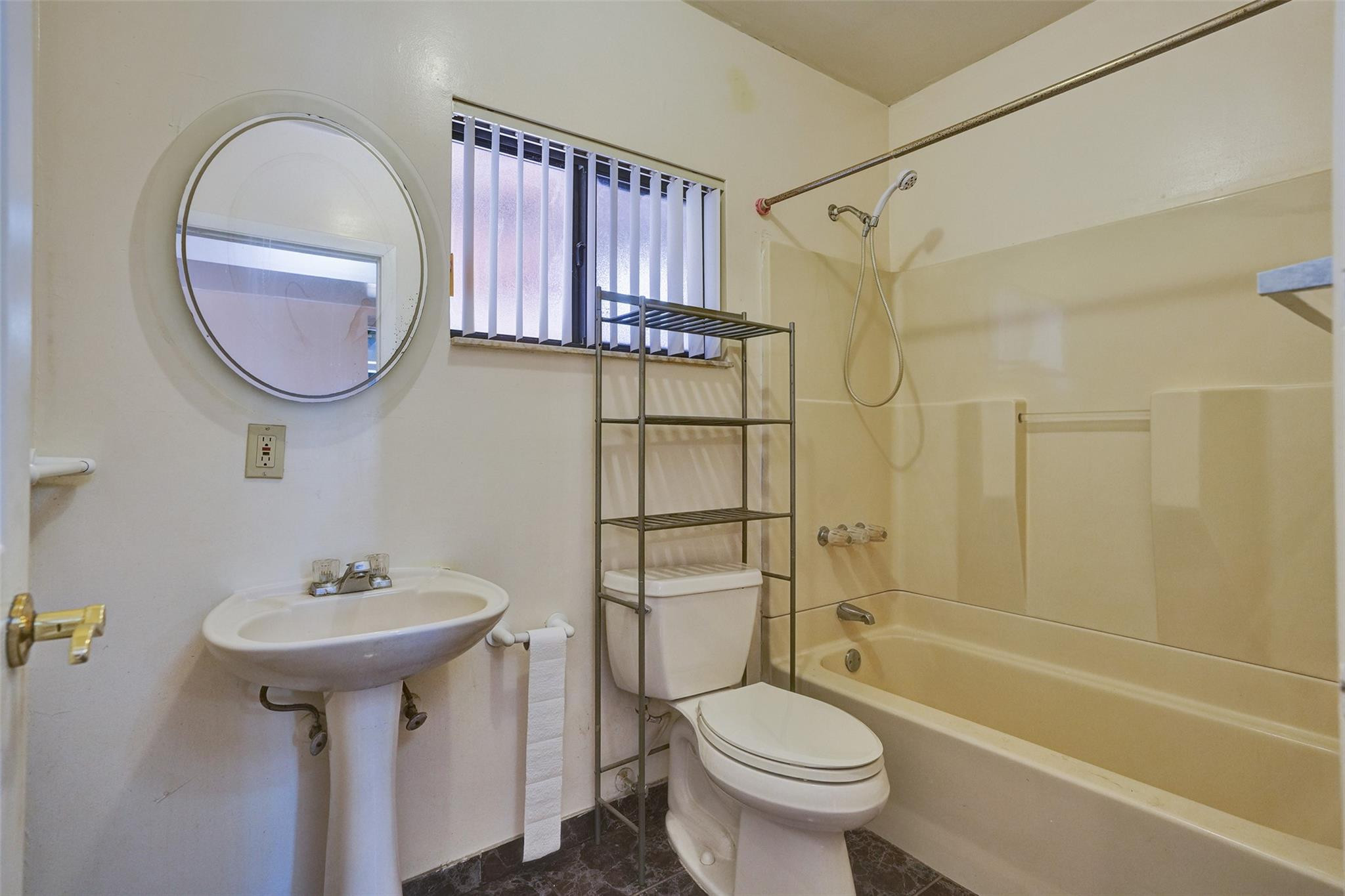225 Pocatella Street Miami Springs, FL 33166 - Photo 20 of 56 a bathroom with a sink toilet and shower