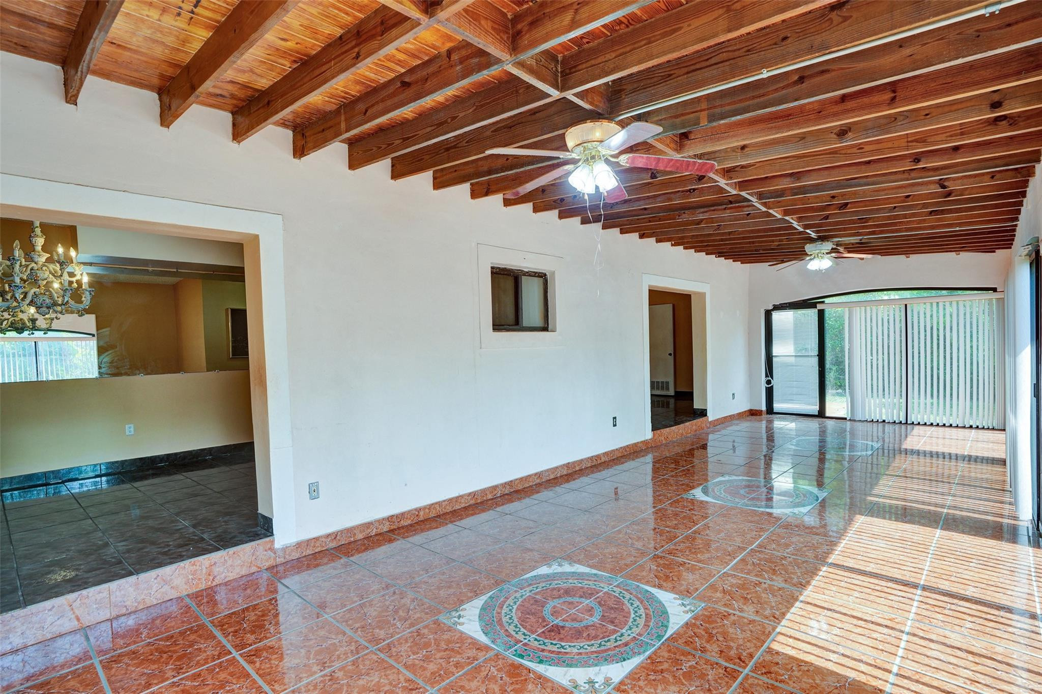 225 Pocatella Street Miami Springs, FL 33166 - Photo 24 of 56 a view of an empty room with a rug