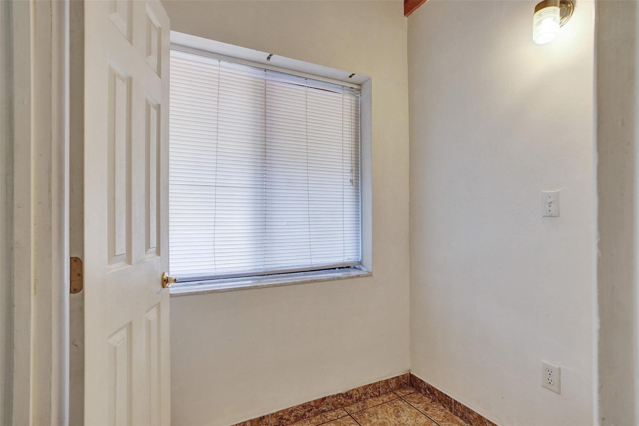 225 Pocatella Street Miami Springs, FL 33166 - Photo 29 of 56 a view of a window in an empty room