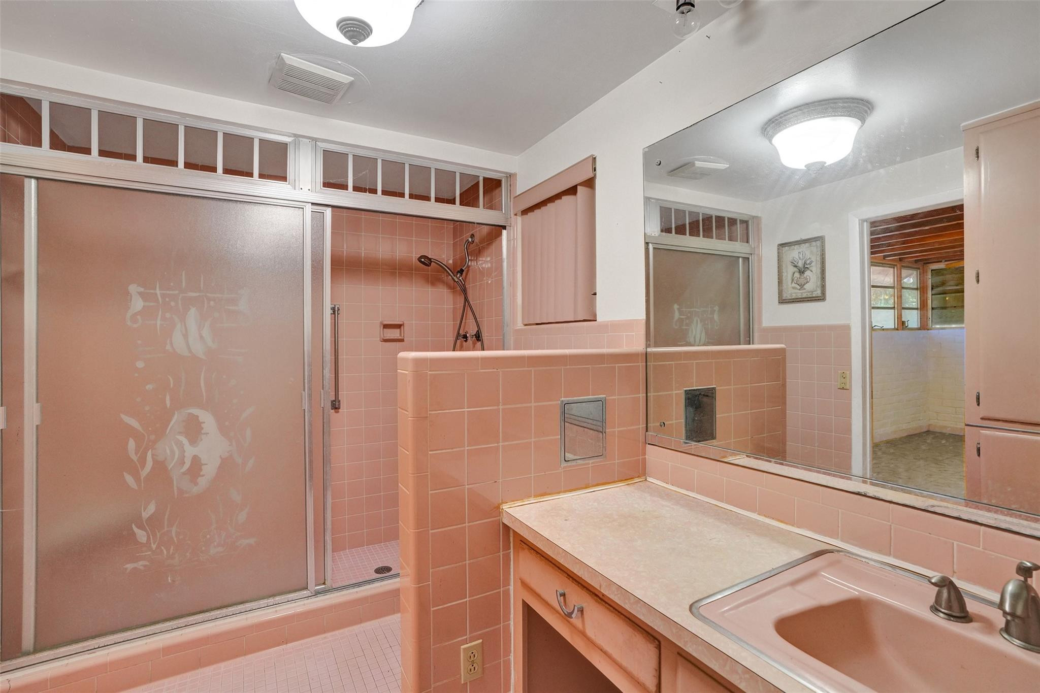 225 Pocatella Street Miami Springs, FL 33166 - Photo 39 of 56 a bathroom with a sink and a mirror