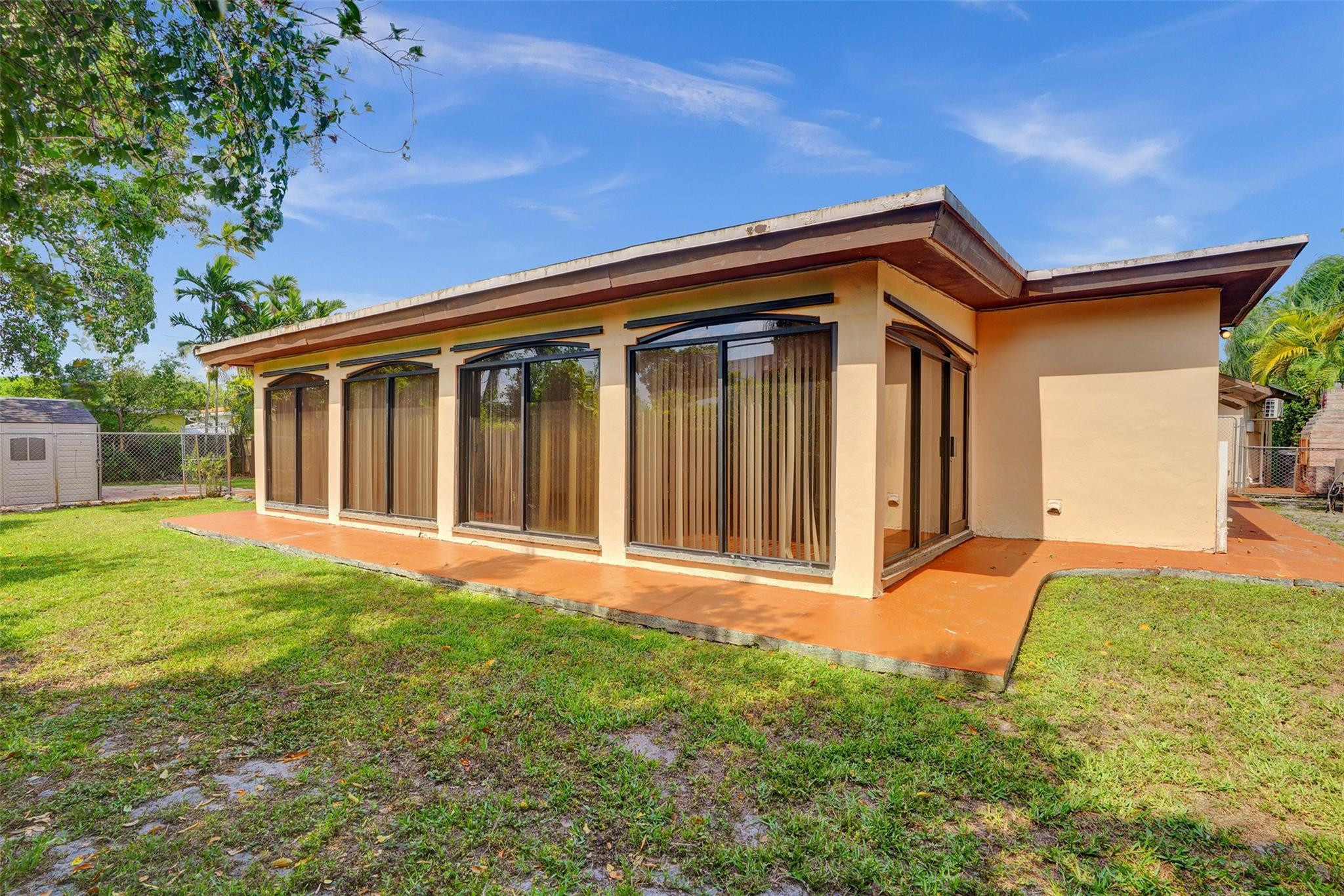225 Pocatella Street Miami Springs, FL 33166 - Photo 41 of 56 a front view of a house with a yard