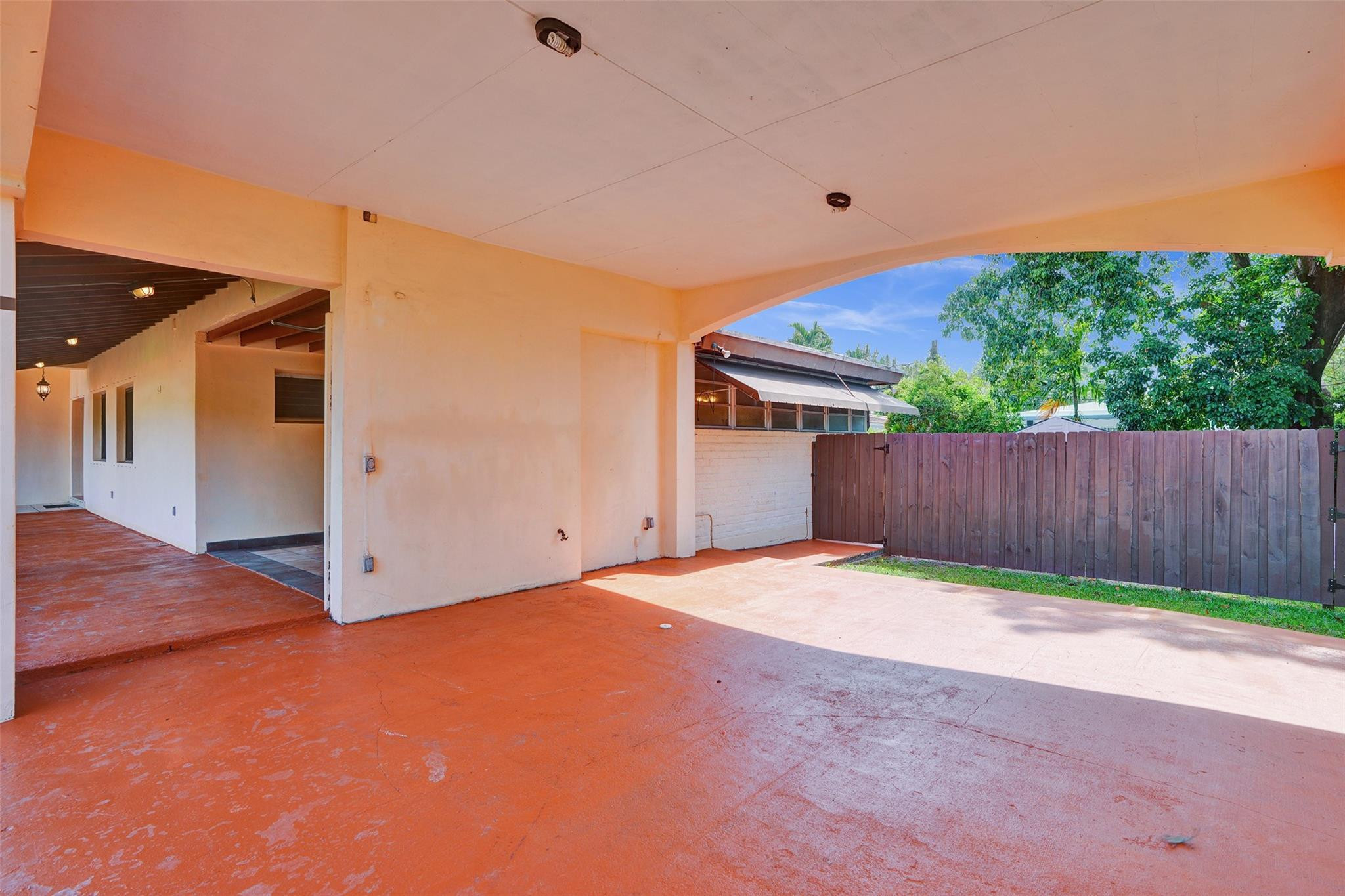 225 Pocatella Street Miami Springs, FL 33166 - Photo 46 of 56 a view of an empty room with wooden fence