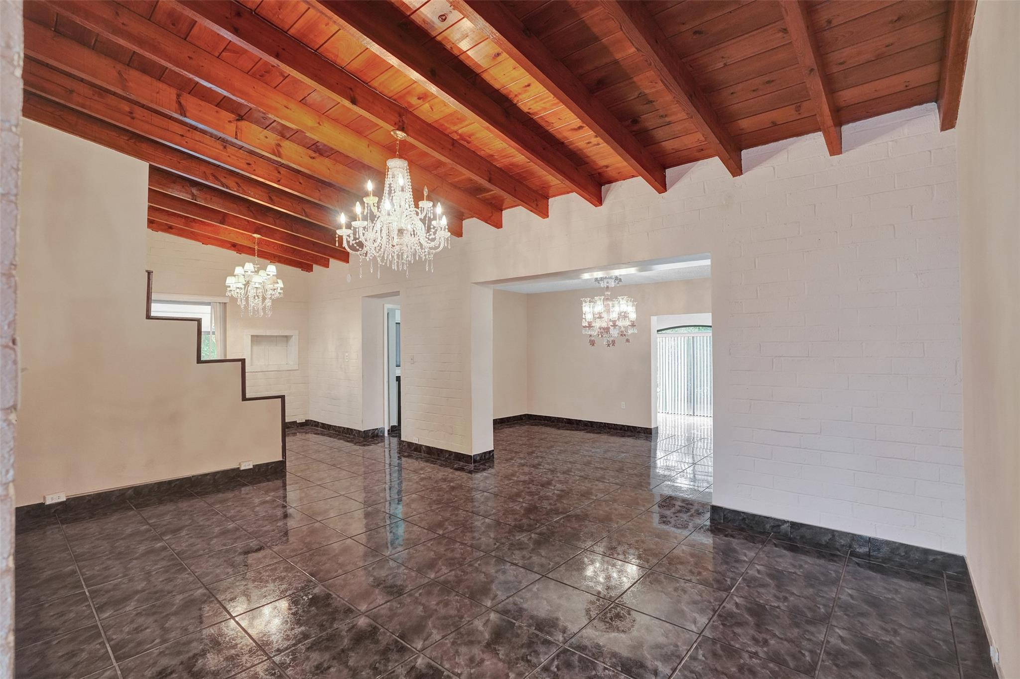 225 Pocatella Street Miami Springs, FL 33166 - Photo 5 of 56 a view of a livingroom with a ceiling fan and window