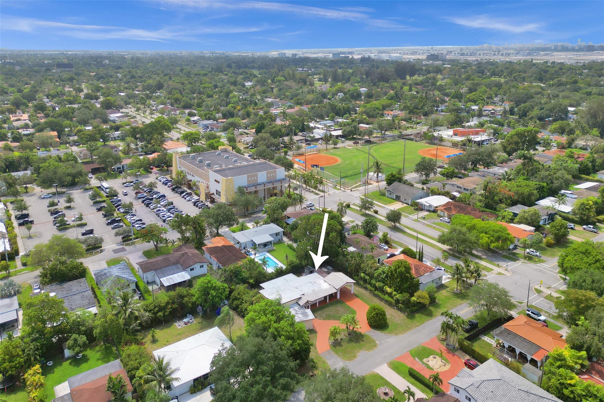 225 Pocatella Street Miami Springs, FL 33166 - Photo 51 of 56 an aerial view of residential houses with city view