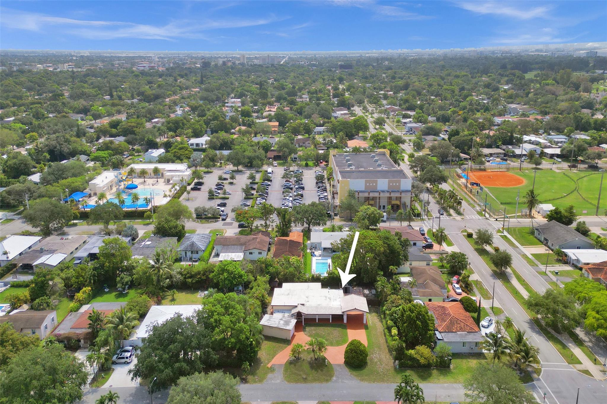 225 Pocatella Street Miami Springs, FL 33166 - Photo 52 of 56 an aerial view of residential houses with city view