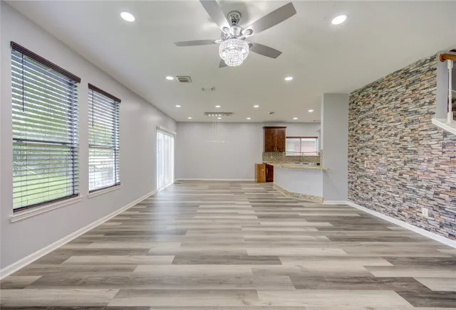 a view of kitchen and hall with a window
