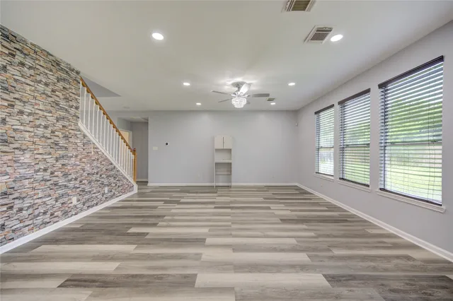 a view of an empty room and window