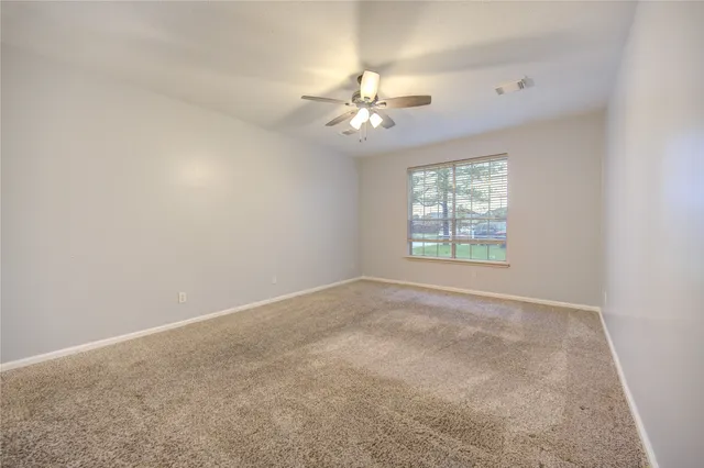 a bathroom with a double vanity sink mirror and