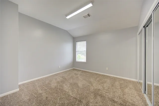 an empty room with an entryway