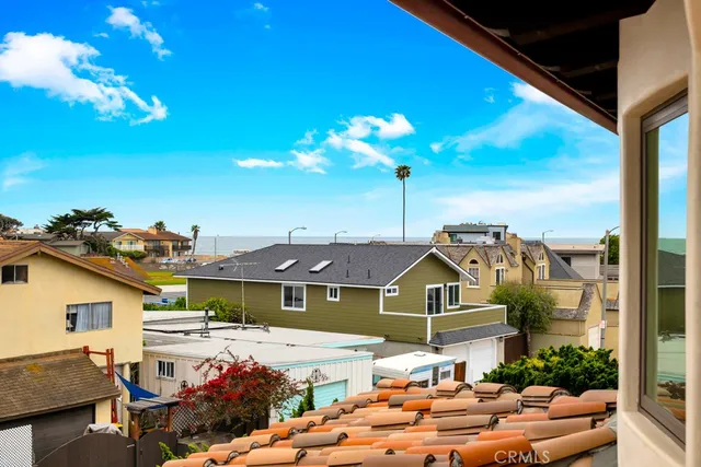 a kitchen with two sink and a refrigerator