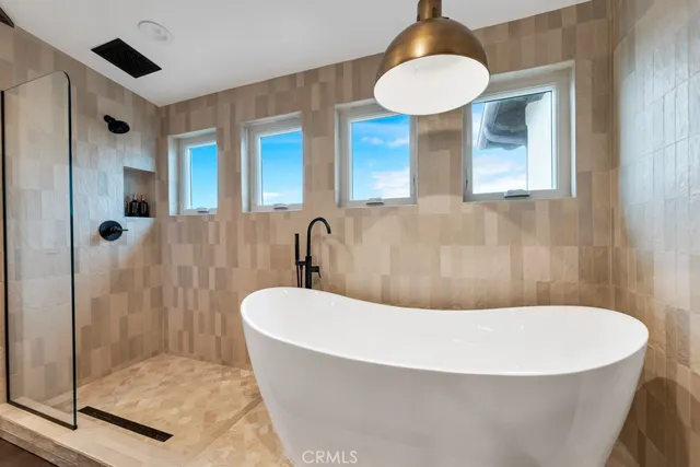 a view of backyard with wooden wall