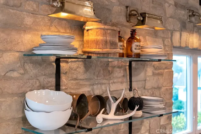 a kitchen with a sink cabinets and stainless steel appliances