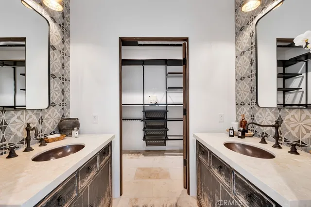 a living room with fireplace furniture and a large window