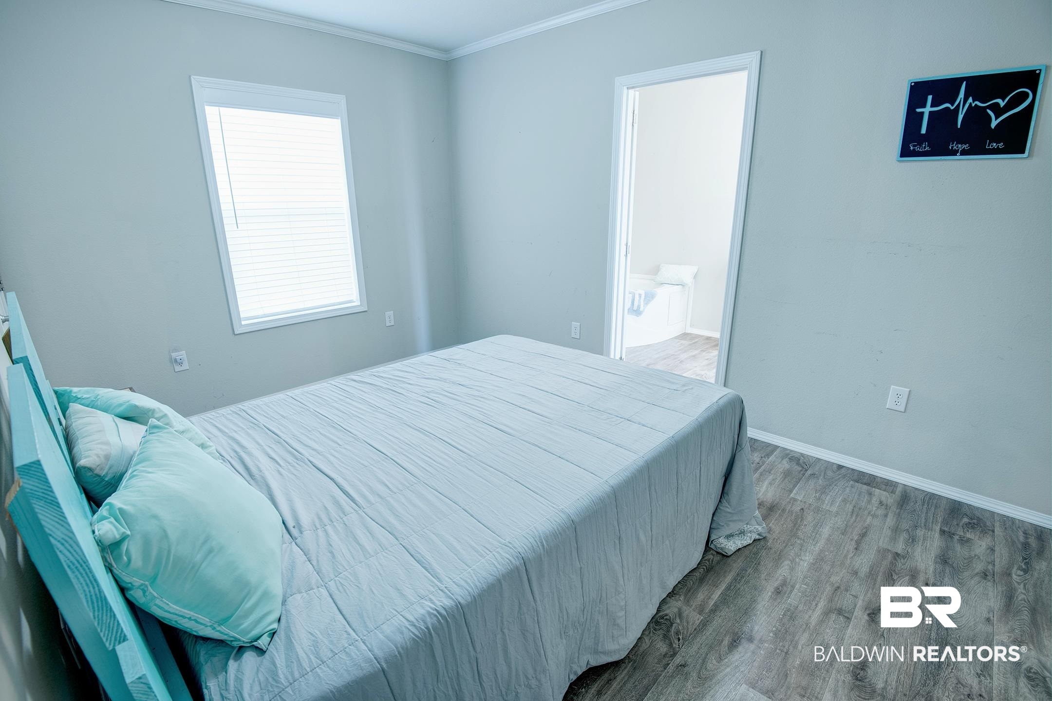 21859 West Side Loop Silverhill, AL 36576 - Photo 20 of 24 Bedroom with light hardwood / wood-style floors and crown molding