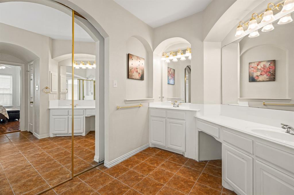 2012 Burnside Drive Allen, TX 75013 - Photo 20 of 40 a spacious bathroom with a double vanity sink and a mirror