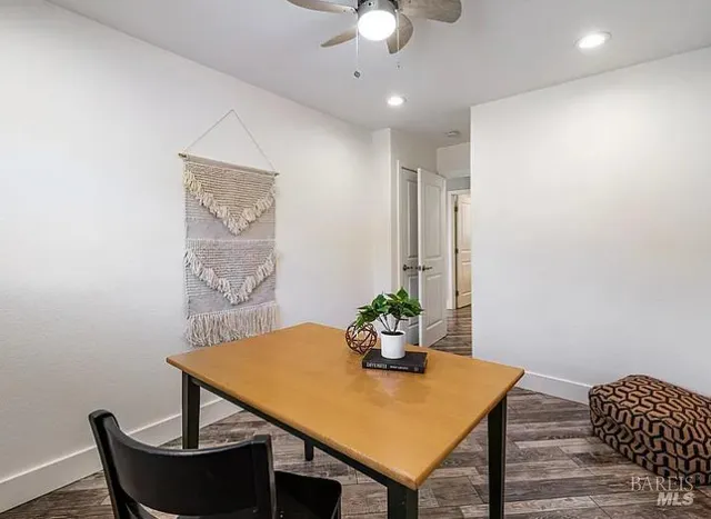 a view of a dining room with furniture