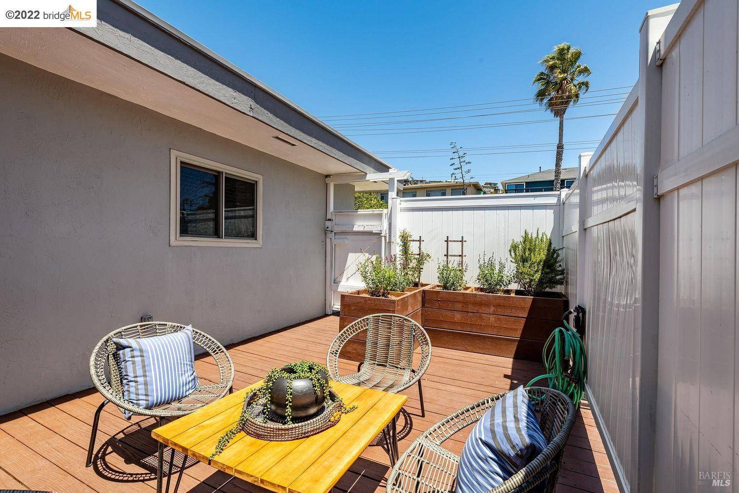 2021 Key Boulevard El Cerrito, CA 94530 - Photo 24 of 30 a view of a dining room with furniture wooden floor and chandelier