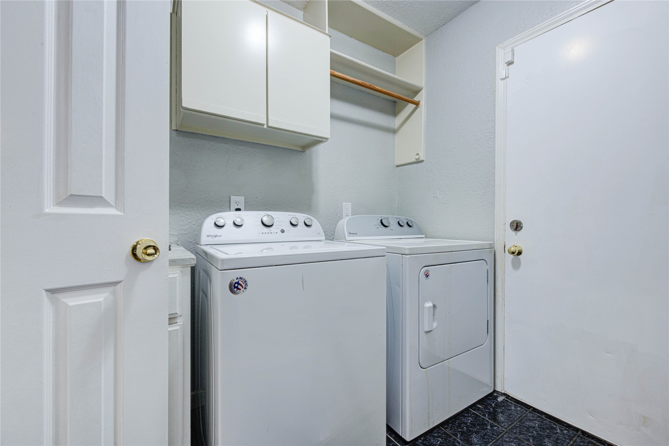 2122 Paso Rello Drive Houston, TX 77077 - Photo 14 of 20 a utility room with dryer and washer