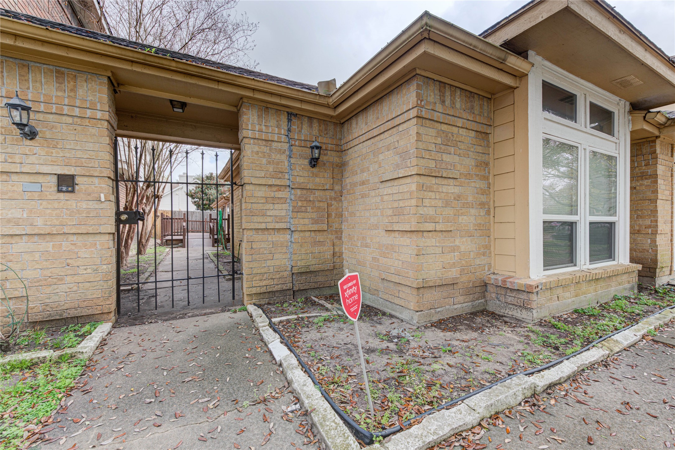 2122 Paso Rello Drive Houston, TX 77077 - Photo 2 of 20 a front view of a house with a yard