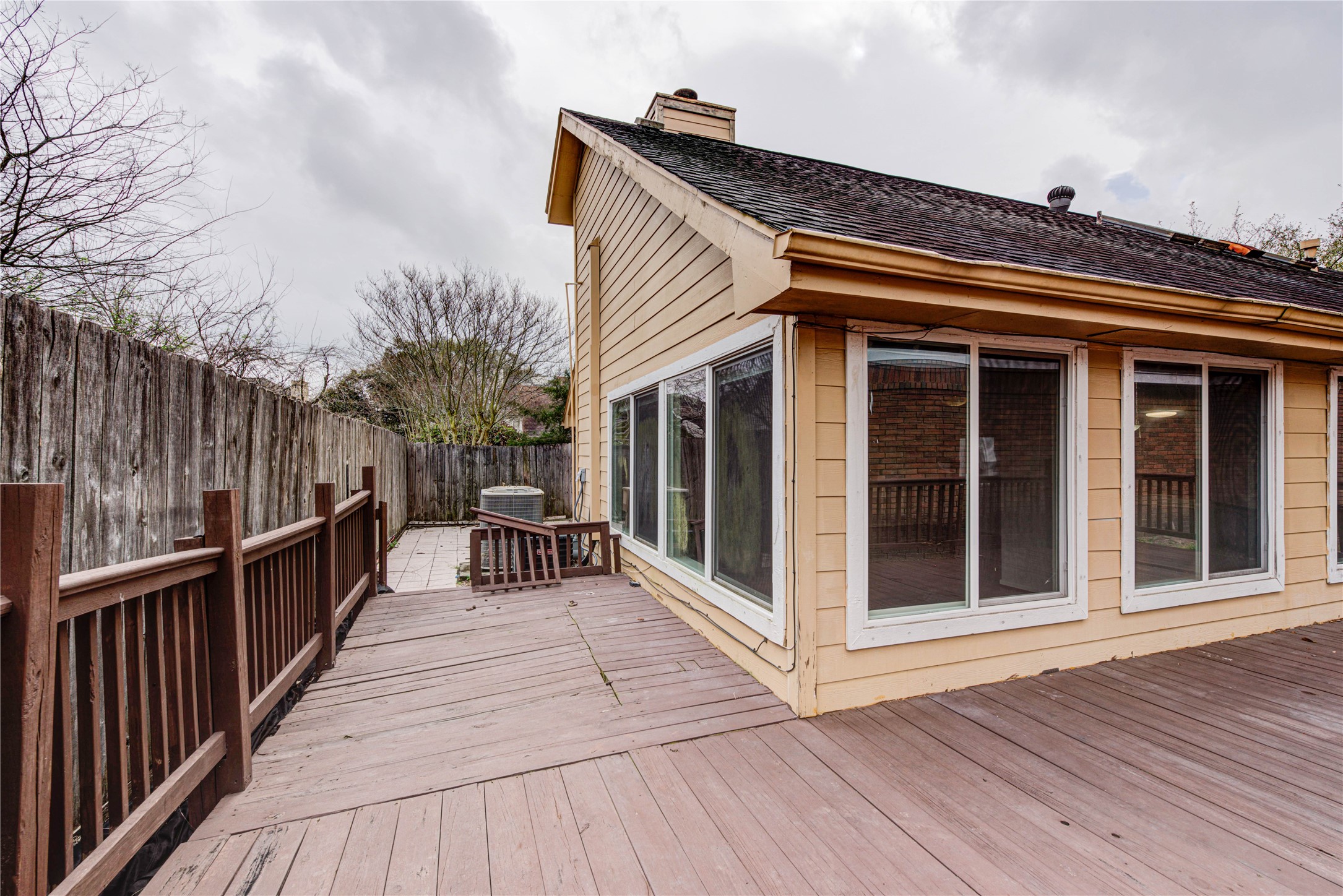 2122 Paso Rello Drive Houston, TX 77077 - Photo 4 of 20 a view of house with deck and outdoor seating
