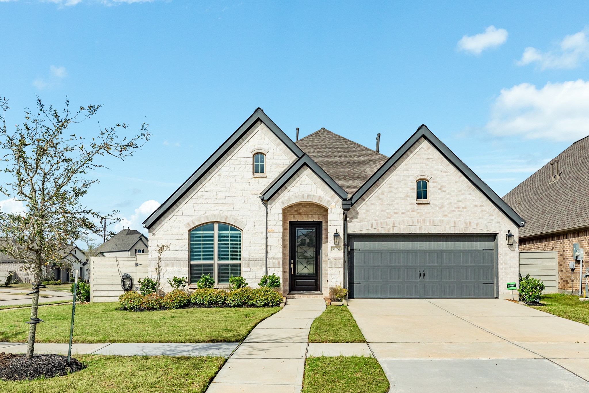 5138 Walnut Grv Lane Manvel, TX 77578 - Photo 1 of 43 a front view of a house with a yard