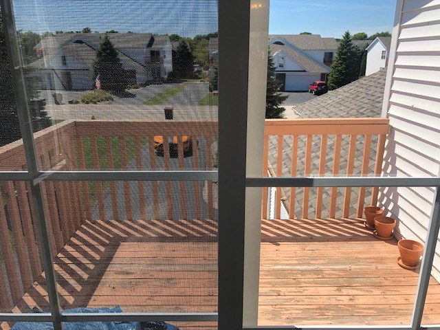 10149 Monarch Road, Unit 4 Roscoe, IL 61073 - Photo 20 of 21 a view of balcony with furniture