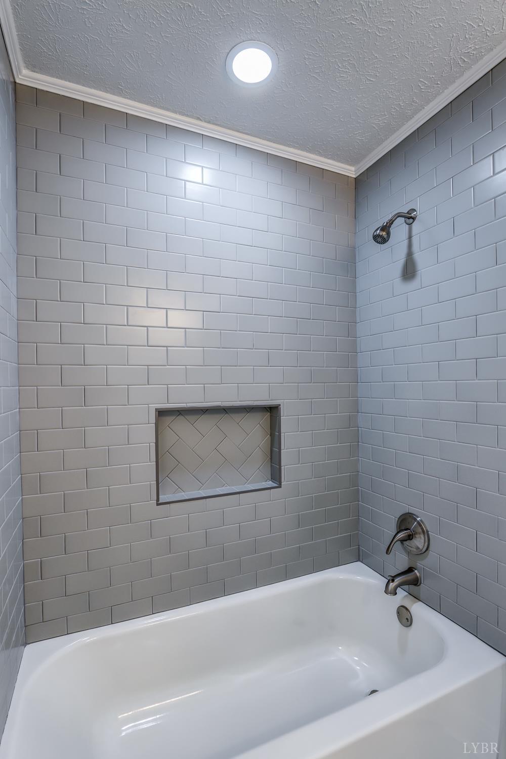 303 Grove Street Hurt, VA 24563 - Photo 23 of 51 a bathroom with a bathtub