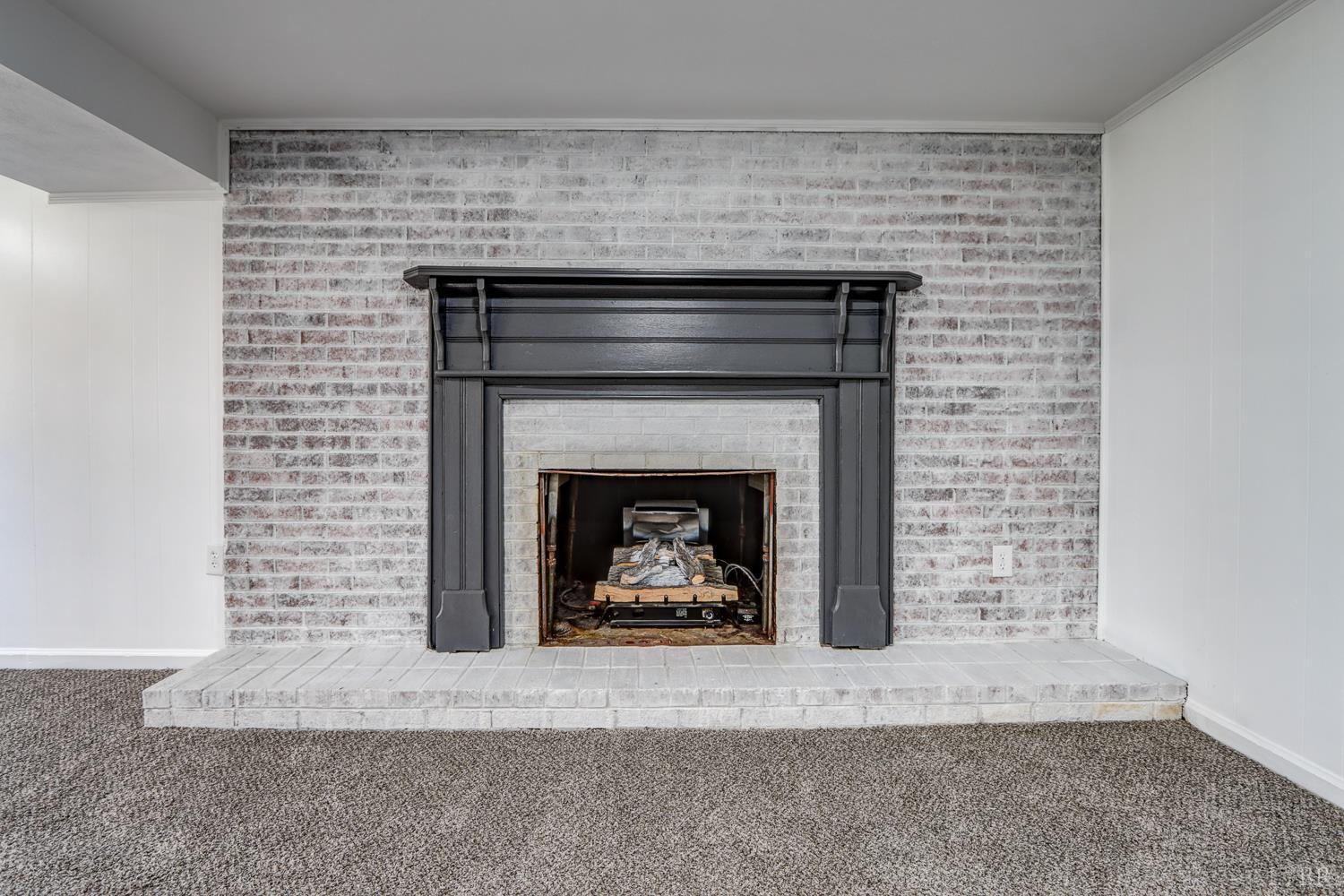 303 Grove Street Hurt, VA 24563 - Photo 34 of 51 a living room with a fireplace