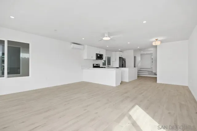 a view of a kitchen with a sink
