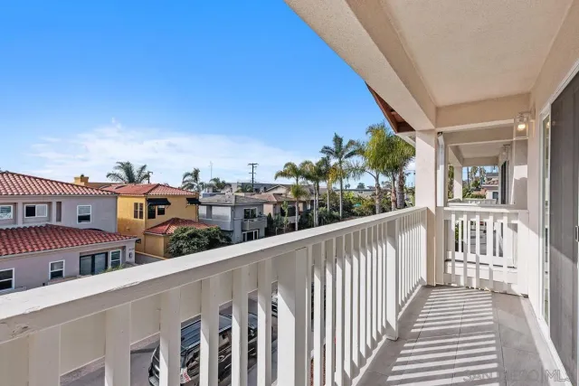 a view of city from a balcony