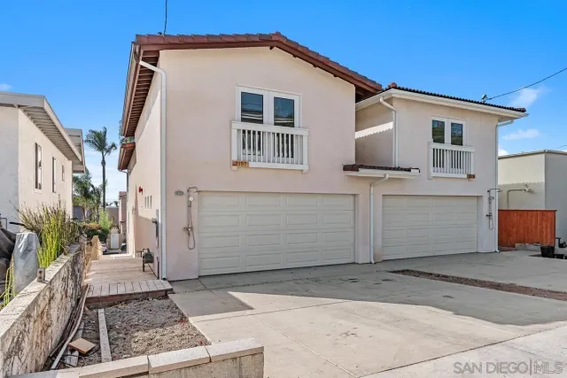 a view of a house with a street