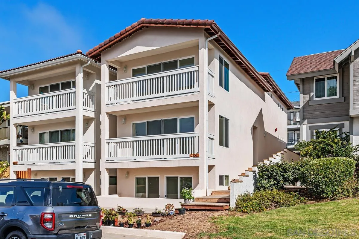 2157 Manchester Avenue Cardiff, CA 92007 - Photo 33 of 35 a front view of a house with a yard