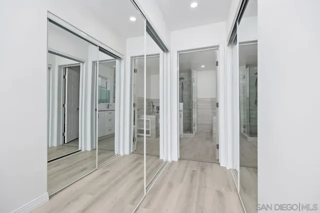 a view of entryway with wooden floor