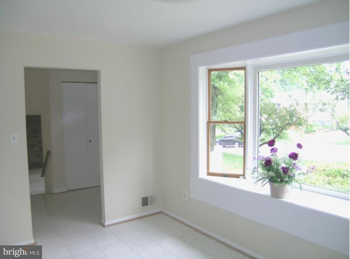 1708 Woodwell Road Silver Spring, MD 20906 - Photo 2 of 18 Kitchen opening to front foyer