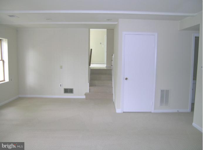 1708 Woodwell Road Silver Spring, MD 20906 - Photo 12 of 18 Family Room looking at stairs to main level