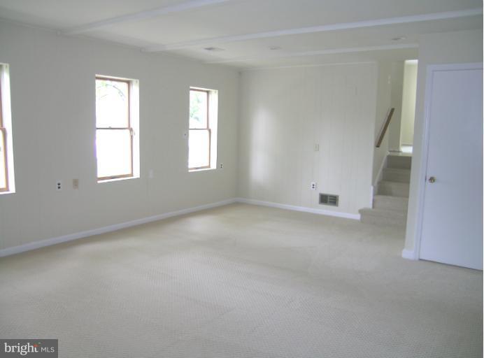 1708 Woodwell Road Silver Spring, MD 20906 - Photo 16 of 18 Family Room with a wall of windows
