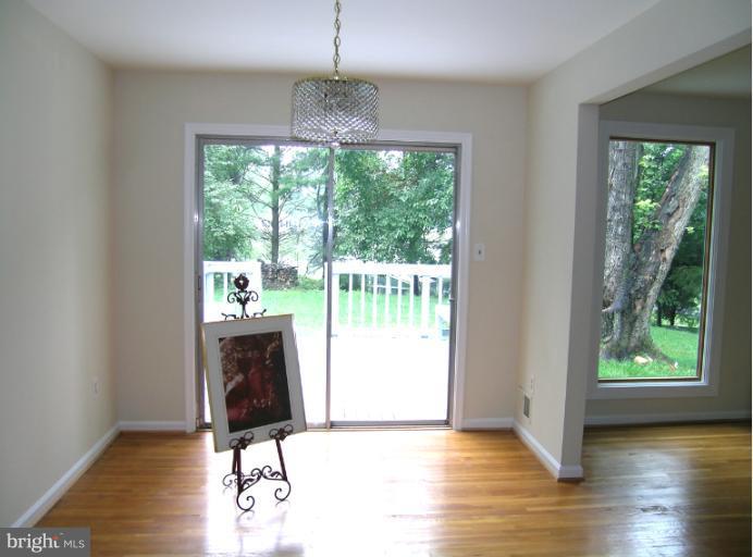 1708 Woodwell Road Silver Spring, MD 20906 - Photo 8 of 18 Dining Room opening to deck