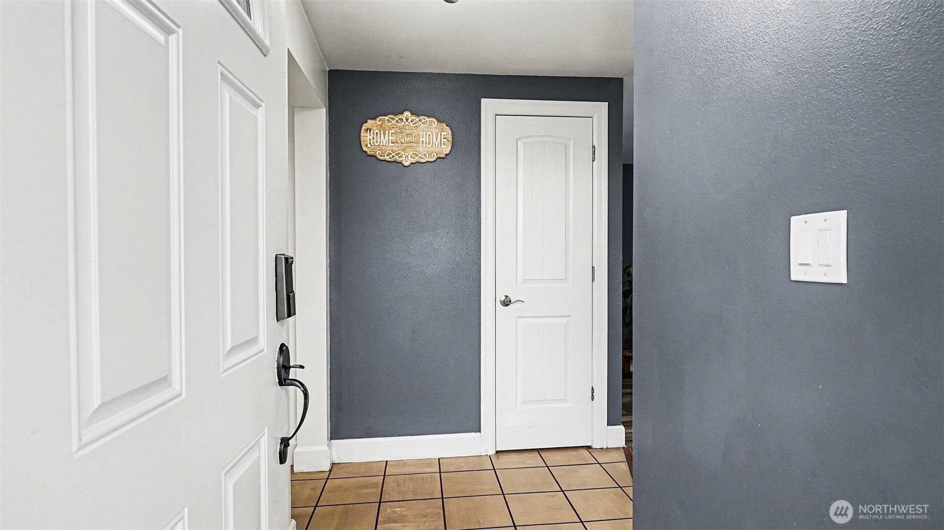 544 Simons Road Monroe, WA 98272 - Photo 21 of 34 a view of a hallway with wooden door
