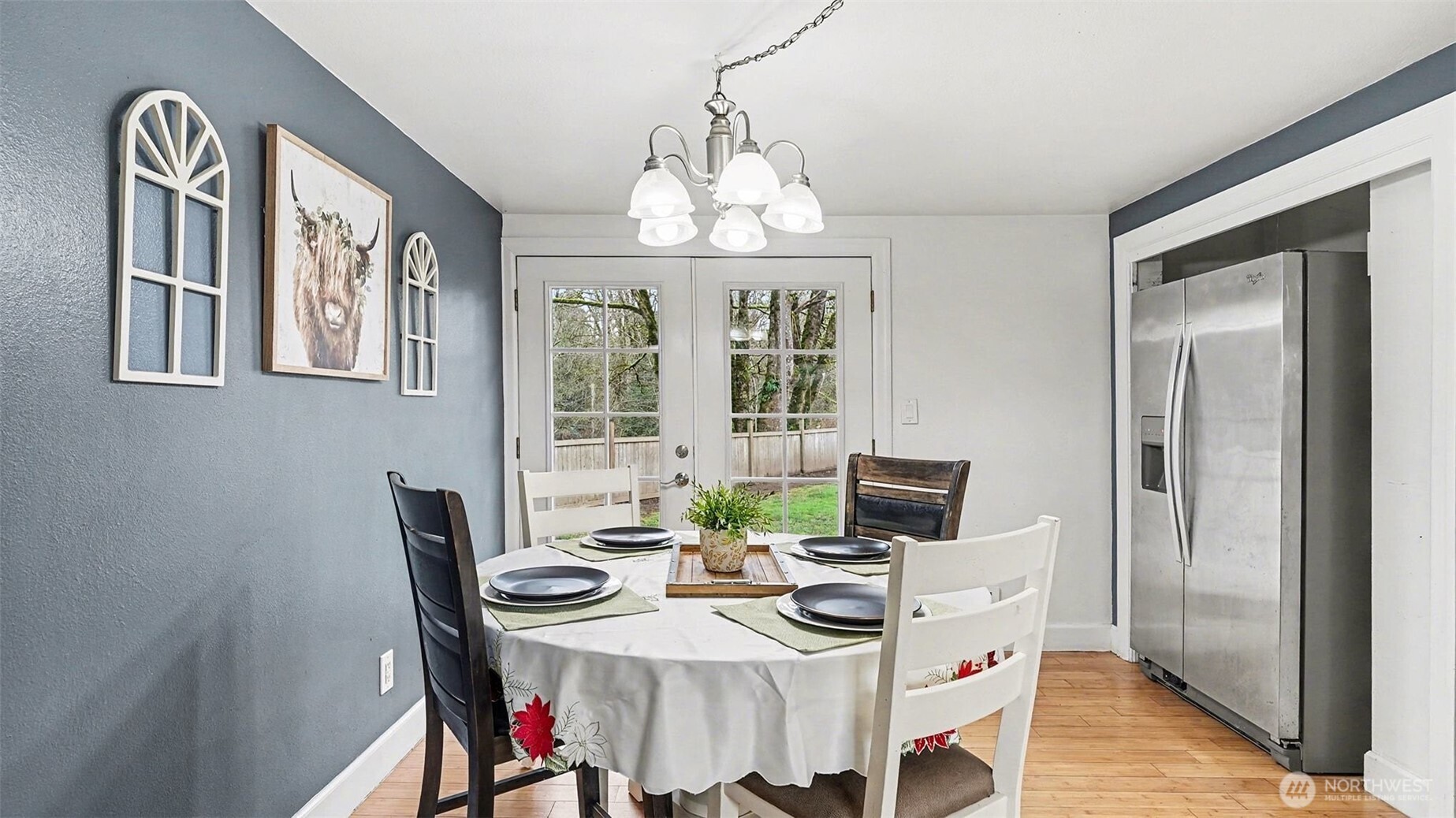 544 Simons Road Monroe, WA 98272 - Photo 8 of 34 a view of a dining room with furniture window and wooden floor