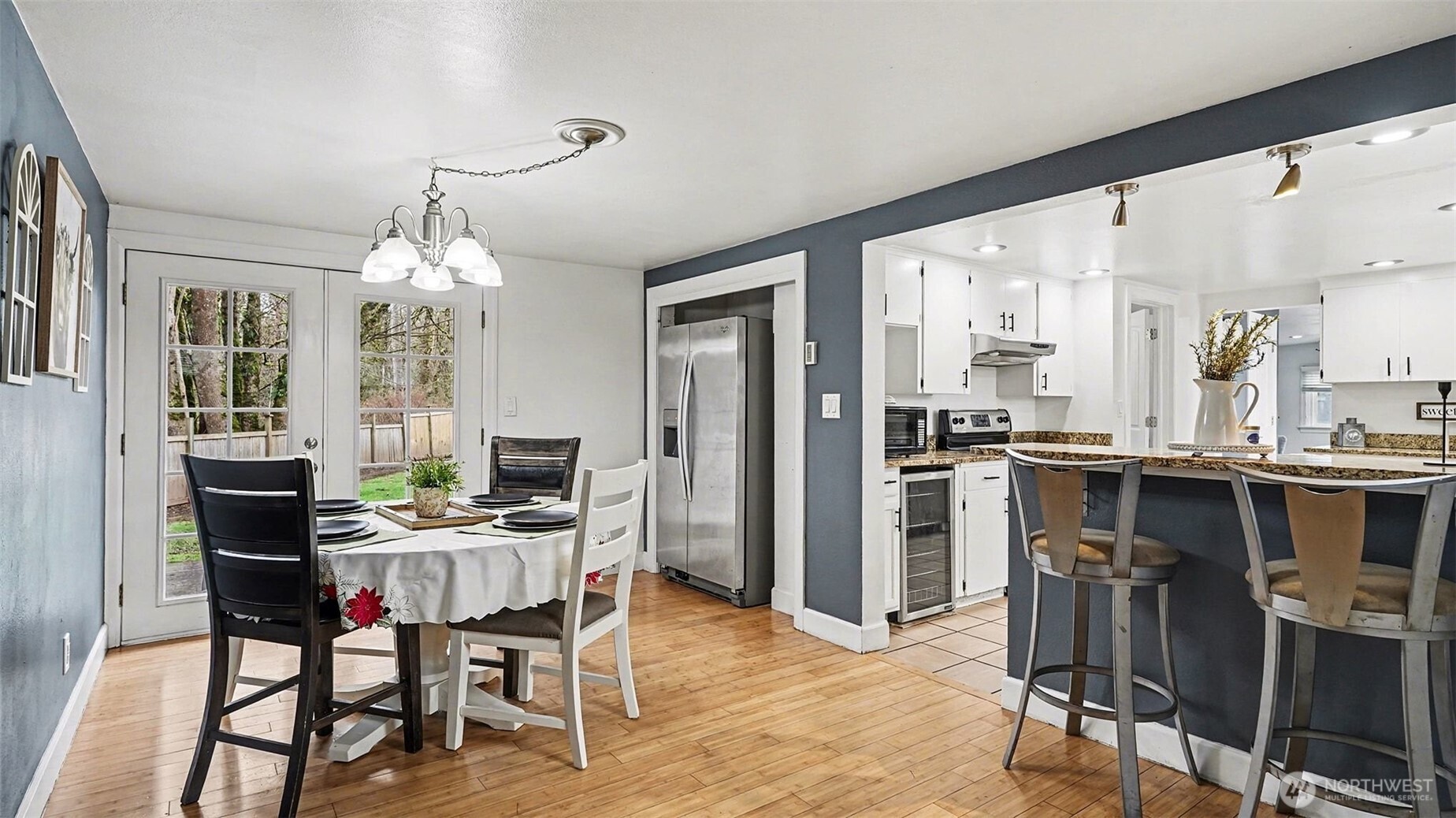 544 Simons Road Monroe, WA 98272 - Photo 9 of 34 a view of a dining room with furniture and chandelier